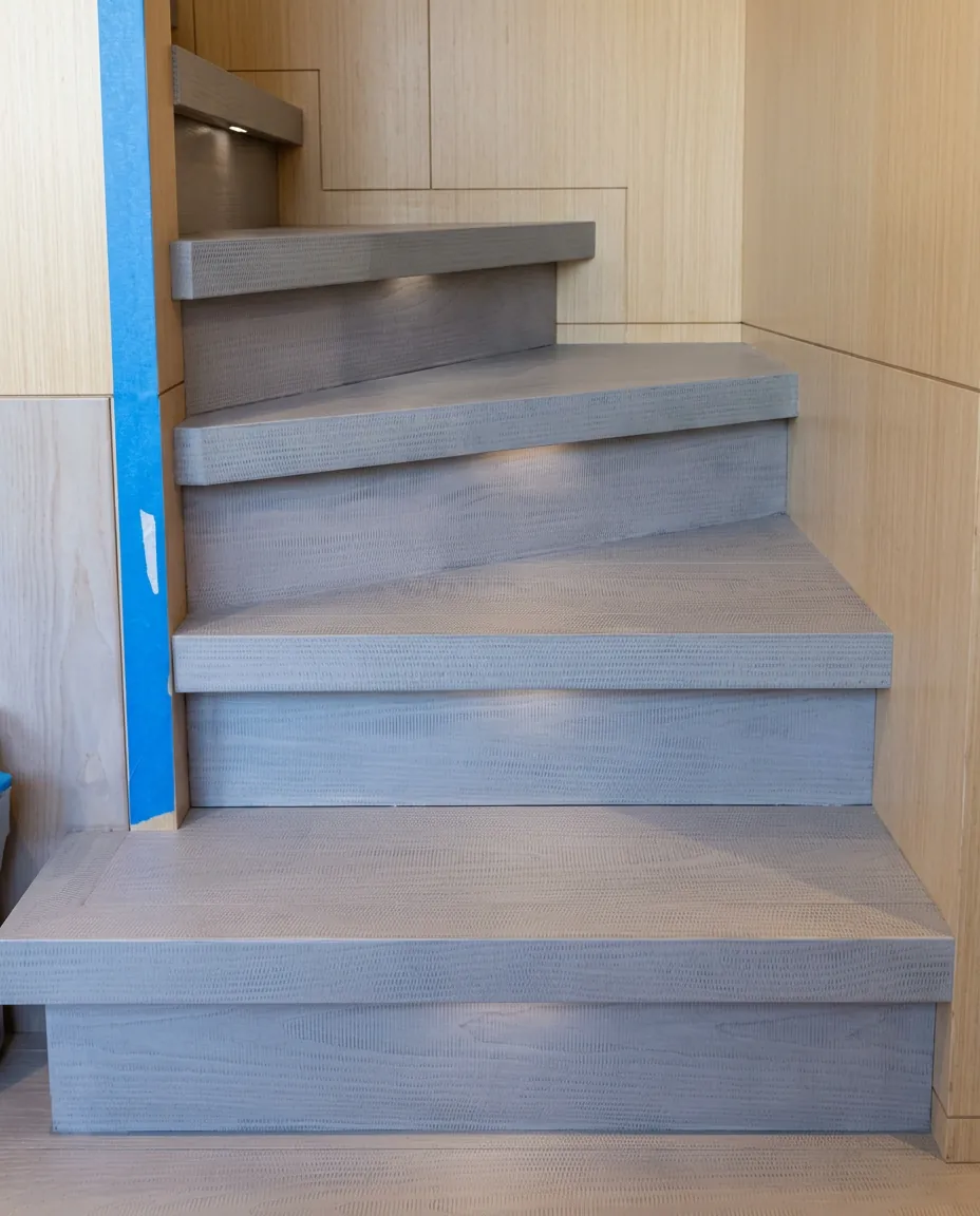 Yacht interior stairs prepared before varnishing